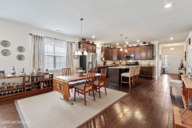 dining room featuring dark hardwood / wood-style floors