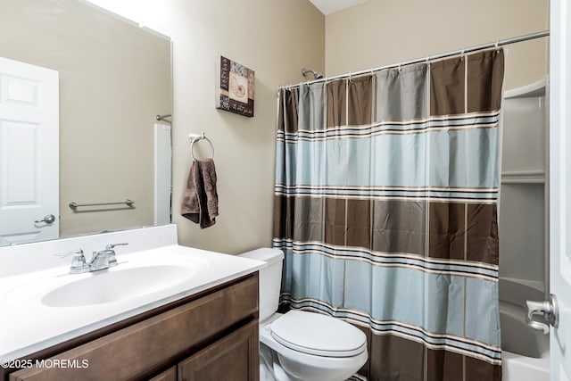 full bathroom featuring toilet, shower / tub combo, and vanity