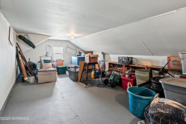 additional living space featuring vaulted ceiling