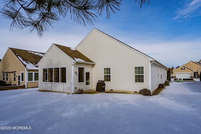 view of snow covered house