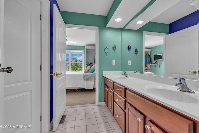 bathroom with vanity and tile patterned floors