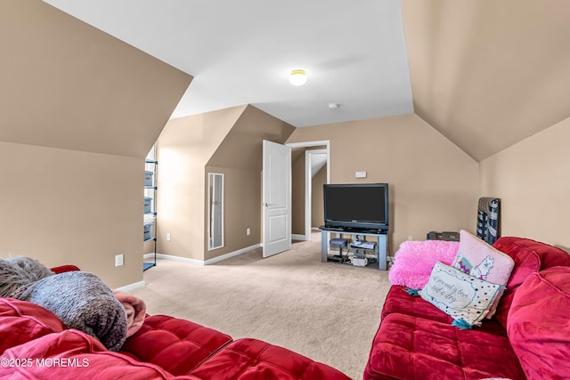 carpeted living room with lofted ceiling