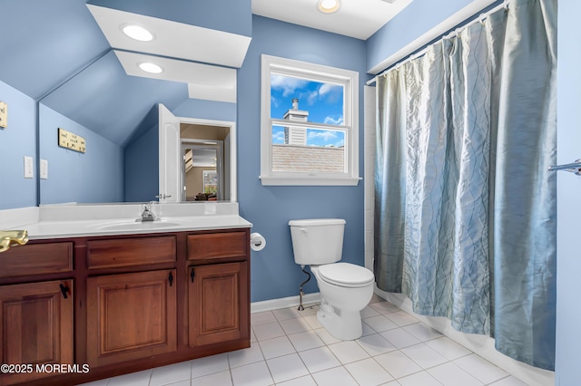 bathroom featuring toilet, tile patterned floors, a shower with shower curtain, vanity, and vaulted ceiling