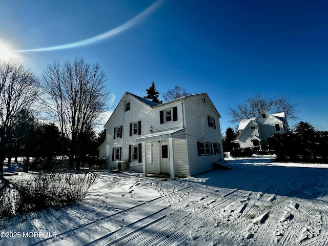 view of front of house with central air condition unit