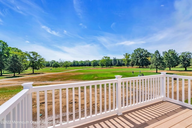 deck featuring a lawn