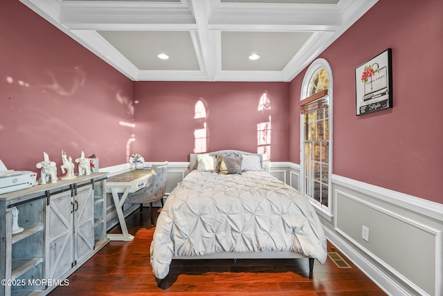 bedroom with crown molding, coffered ceiling, dark wood-type flooring, and beamed ceiling