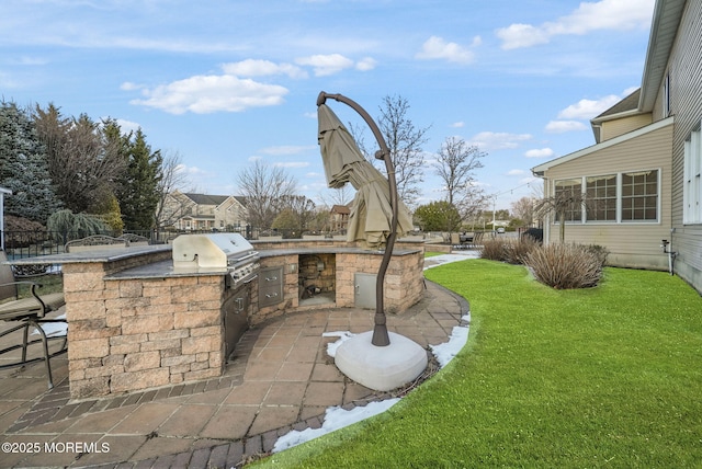 view of yard featuring area for grilling and a patio area