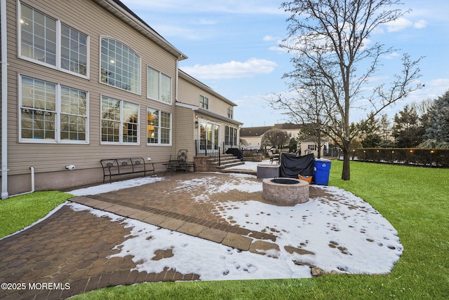 view of patio featuring a fire pit