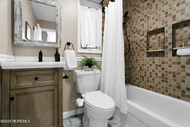 full bathroom with vanity, shower / bath combination with curtain, and toilet