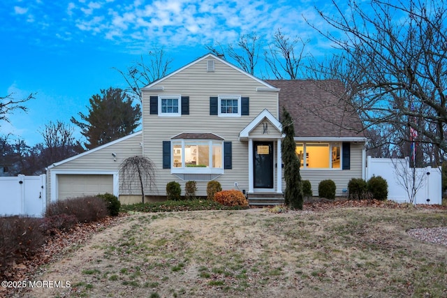 front facade with a garage