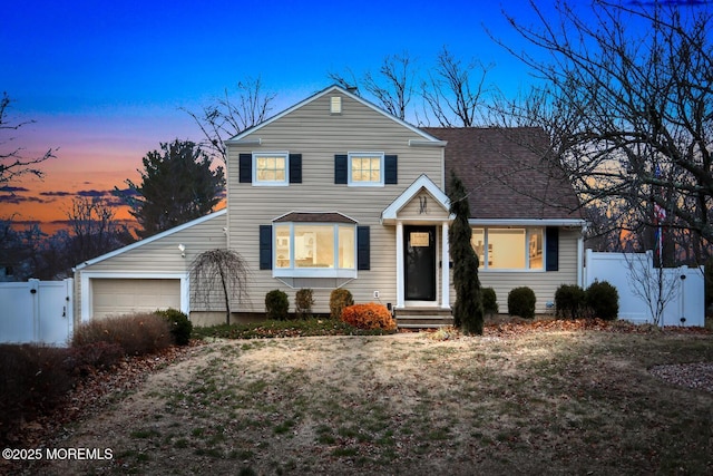 view of front property with a garage