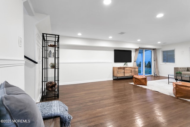 living room with dark wood-type flooring