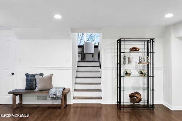 stairway featuring hardwood / wood-style flooring