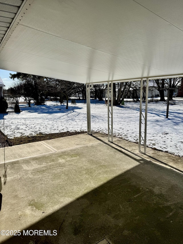 view of snow covered patio