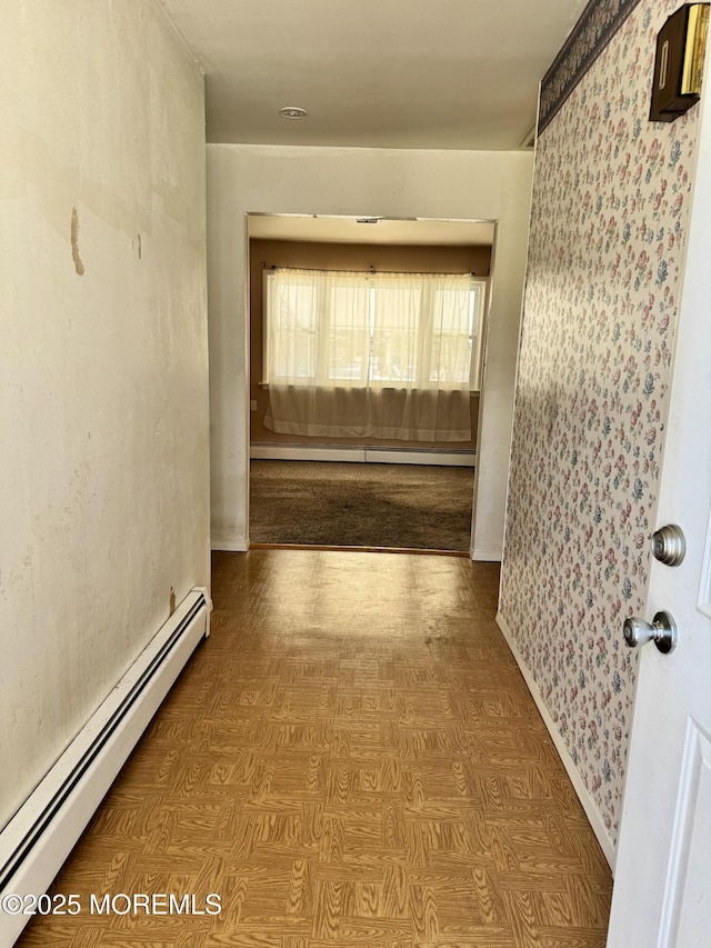 hallway featuring a baseboard radiator