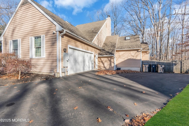 view of home's exterior featuring a garage