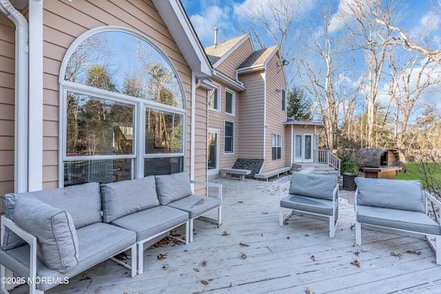 deck featuring an outdoor living space