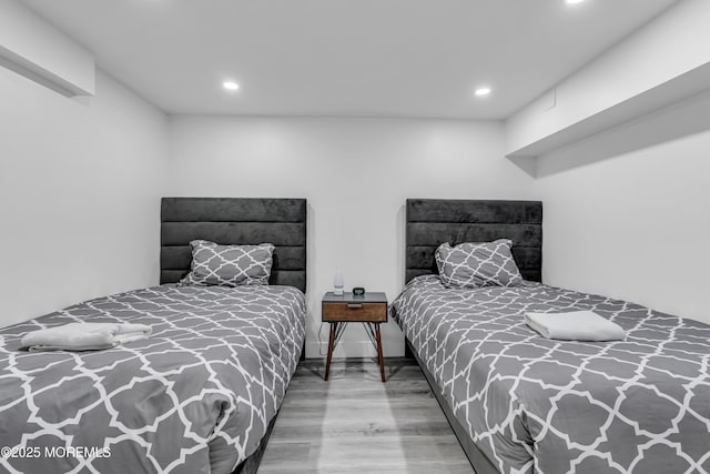 bedroom featuring hardwood / wood-style flooring