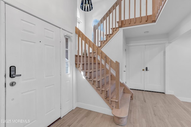 entrance foyer with light hardwood / wood-style floors