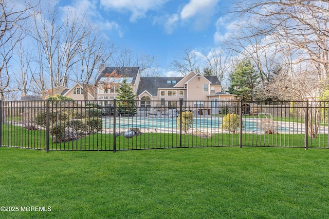 view of yard with a community pool