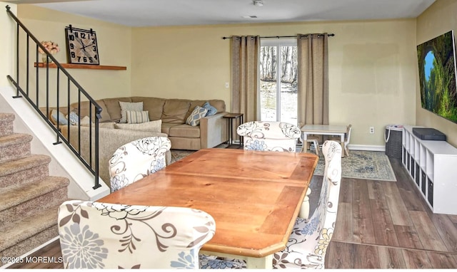 dining area with wood-type flooring