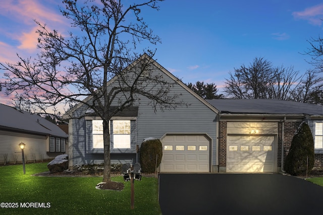 15B Betsy Ross Dr Unit B, Monroe, NJ 08831 - view of front of home featuring a garage and a yard