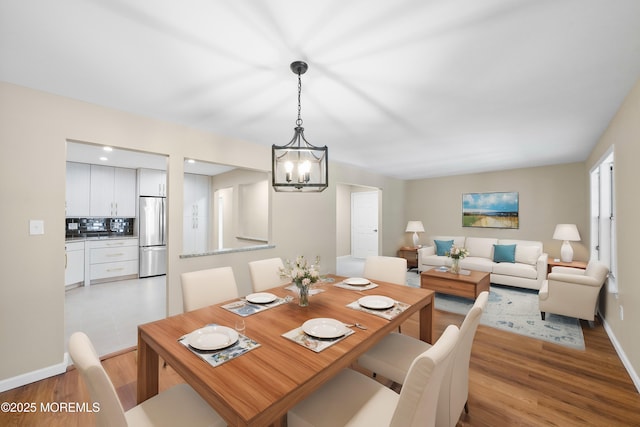 15B Betsy Ross Dr Unit B, Monroe, NJ 08831 - dining space featuring wood-type flooring and an inviting chandelier