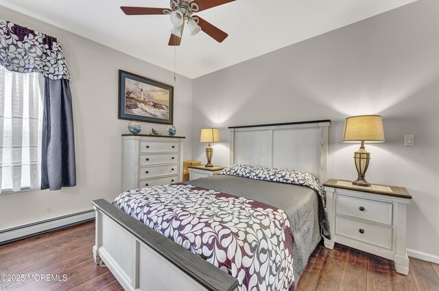 bedroom featuring a baseboard radiator, dark wood-type flooring, and ceiling fan