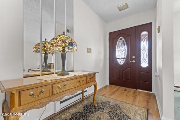 foyer featuring light hardwood / wood-style flooring