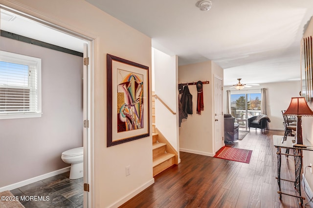 corridor featuring dark hardwood / wood-style floors