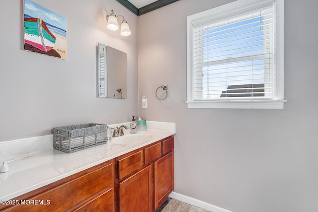 bathroom featuring plenty of natural light and vanity