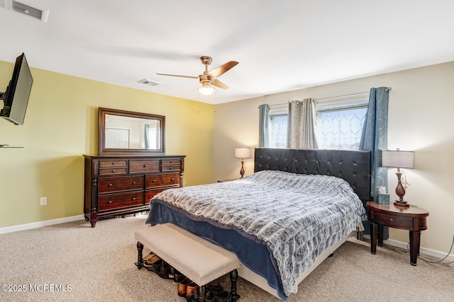 bedroom with ceiling fan and light colored carpet