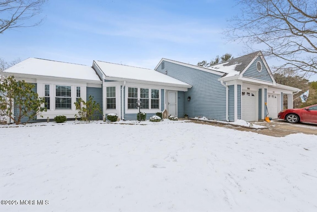 ranch-style home with a garage