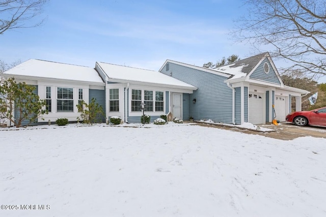 ranch-style home with a garage