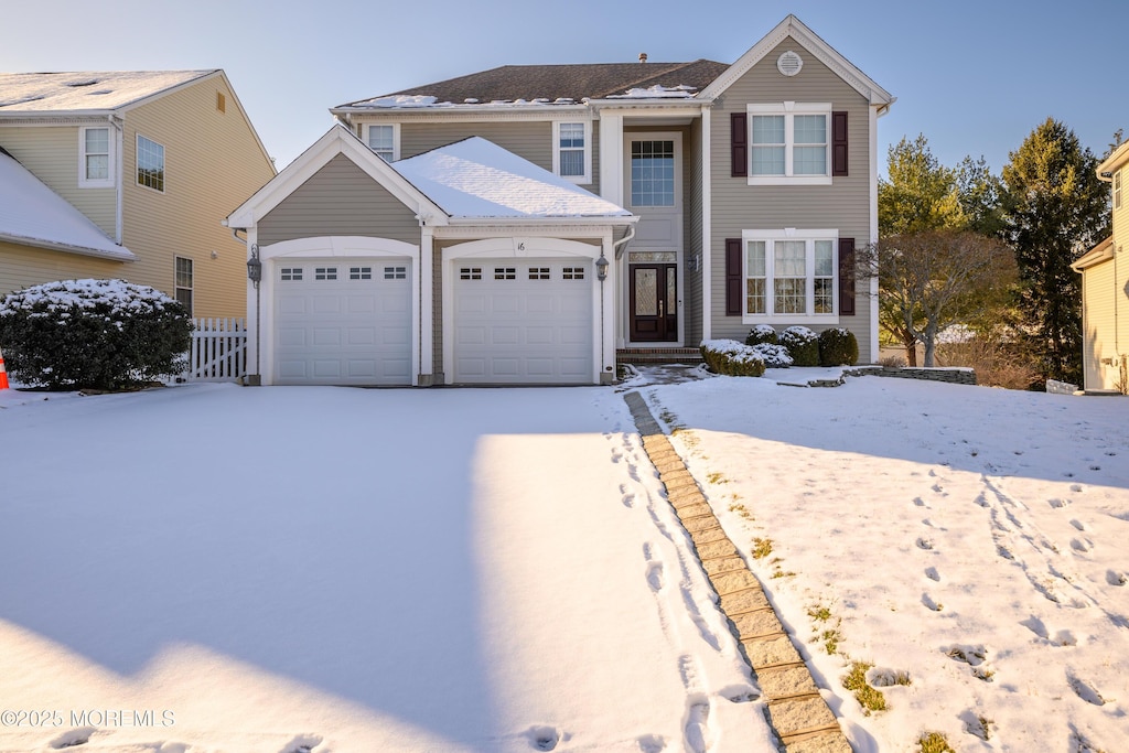 front facade with a garage