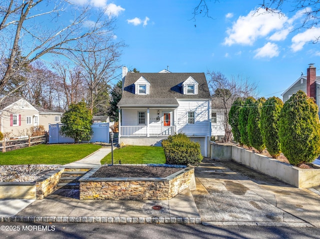 cape cod home with a porch, a garage, and a front yard