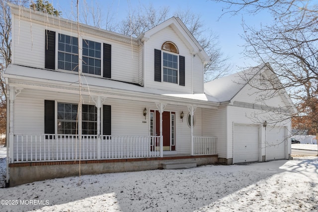 view of front property with a garage and a porch