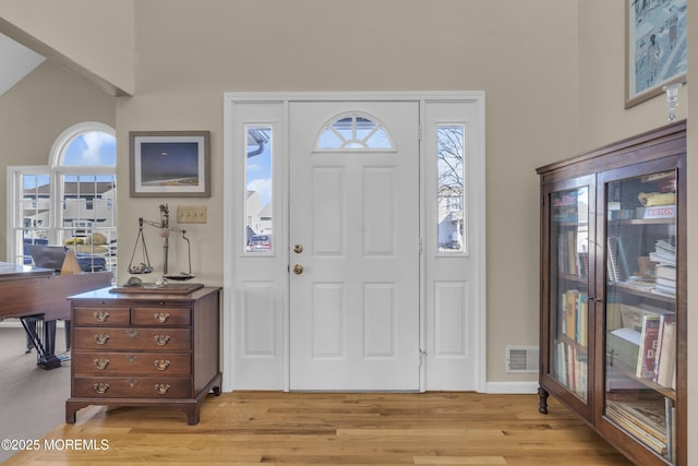 entrance foyer with light hardwood / wood-style floors