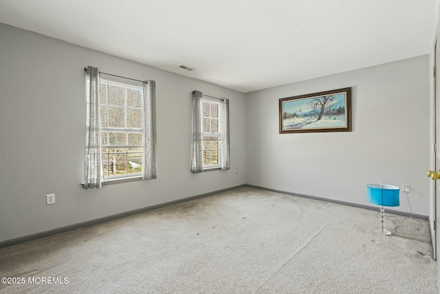 view of carpeted spare room