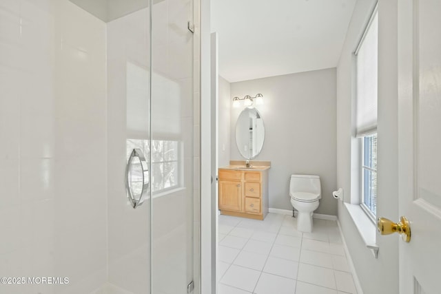 bathroom with vanity, walk in shower, tile patterned floors, and toilet