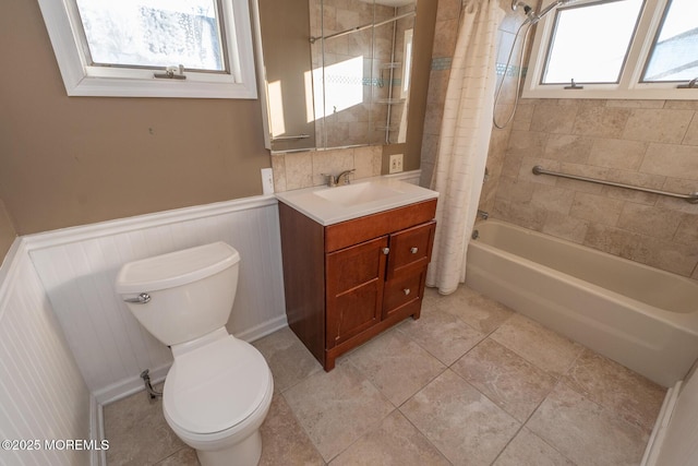 full bathroom featuring shower / tub combo, vanity, tile patterned floors, and toilet