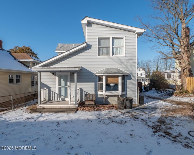 view of snow covered house