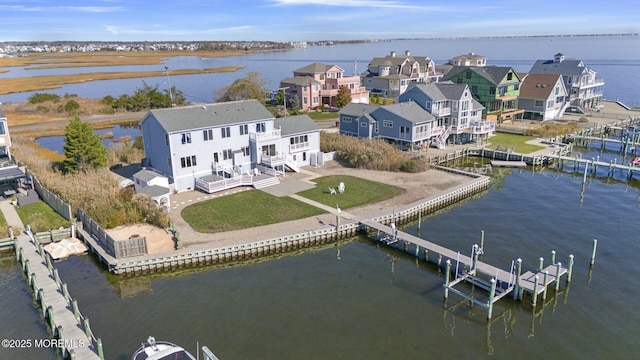 drone / aerial view with a water view