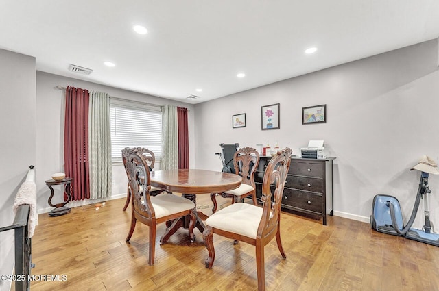 dining room featuring light hardwood / wood-style floors