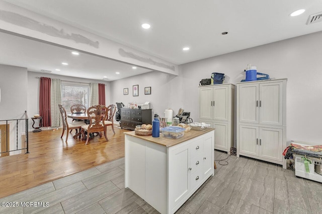 kitchen with white cabinets and a kitchen island