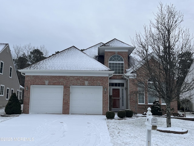 front of property with a garage