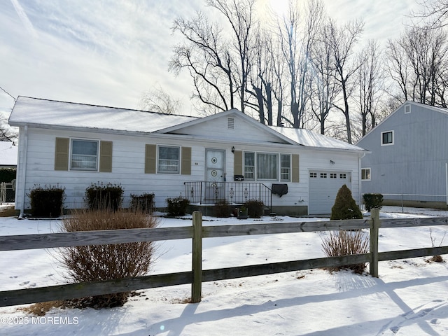 ranch-style home with a garage