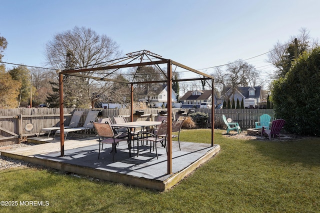 view of yard with a fire pit and a patio