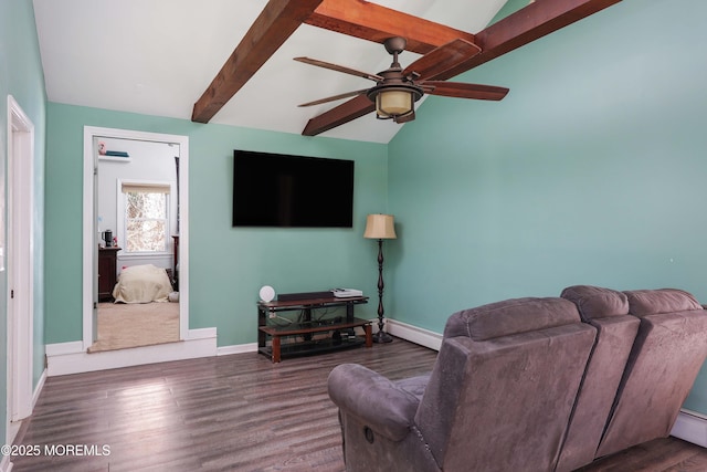 living room with lofted ceiling with beams, ceiling fan, dark hardwood / wood-style flooring, and baseboard heating