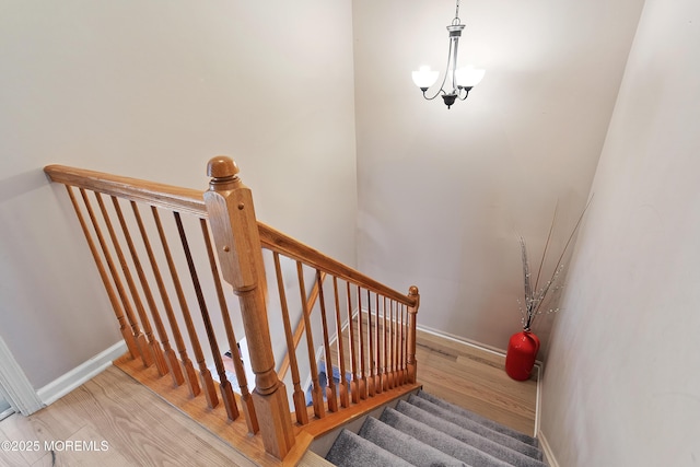 66 Banyan Blvd, Holmdel, NJ 07733 - stairway featuring wood finished floors and baseboards